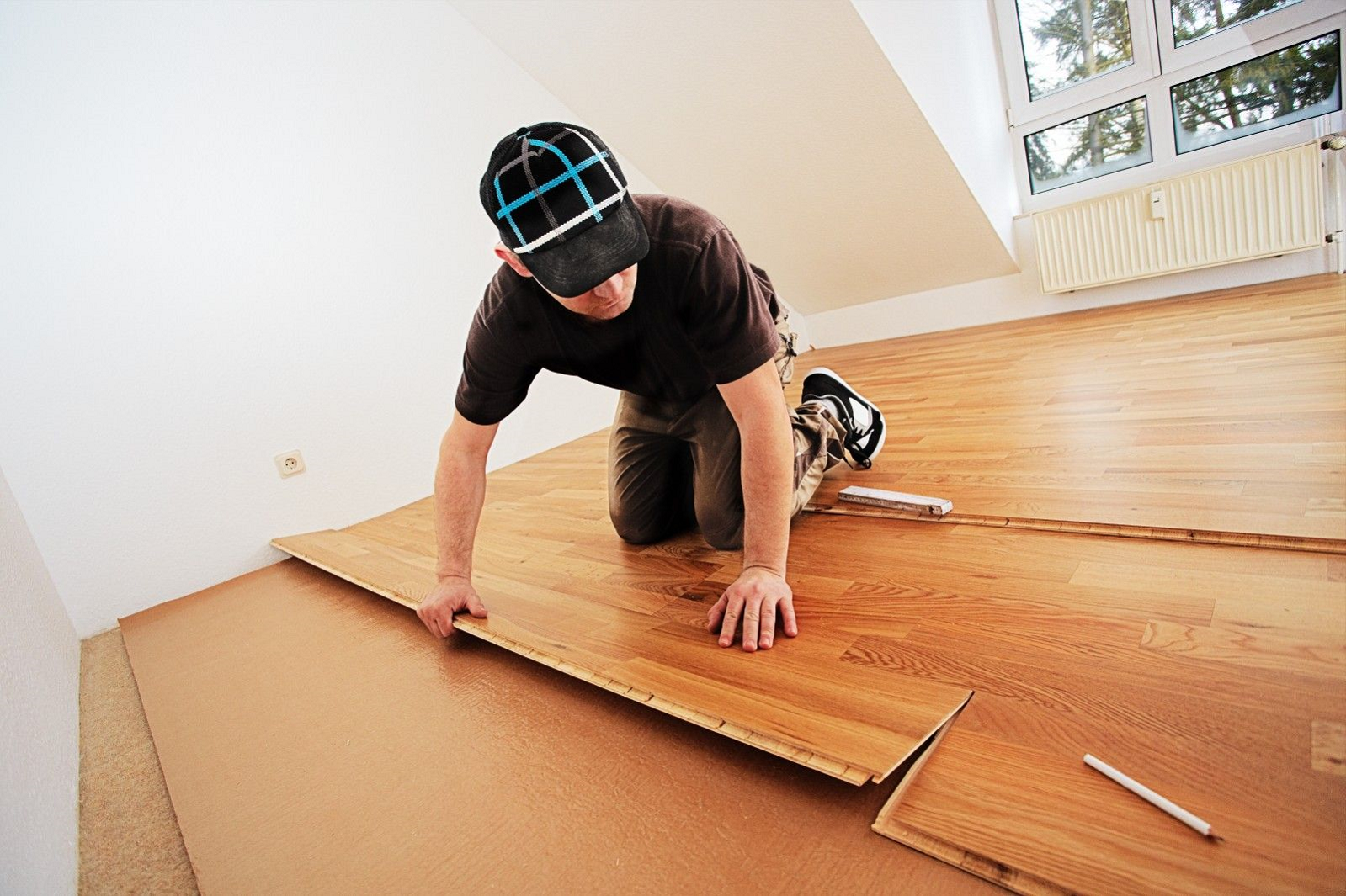 Quality laminate flooring installation in Fort Collins, CO showcasing durable and stylish flooring options